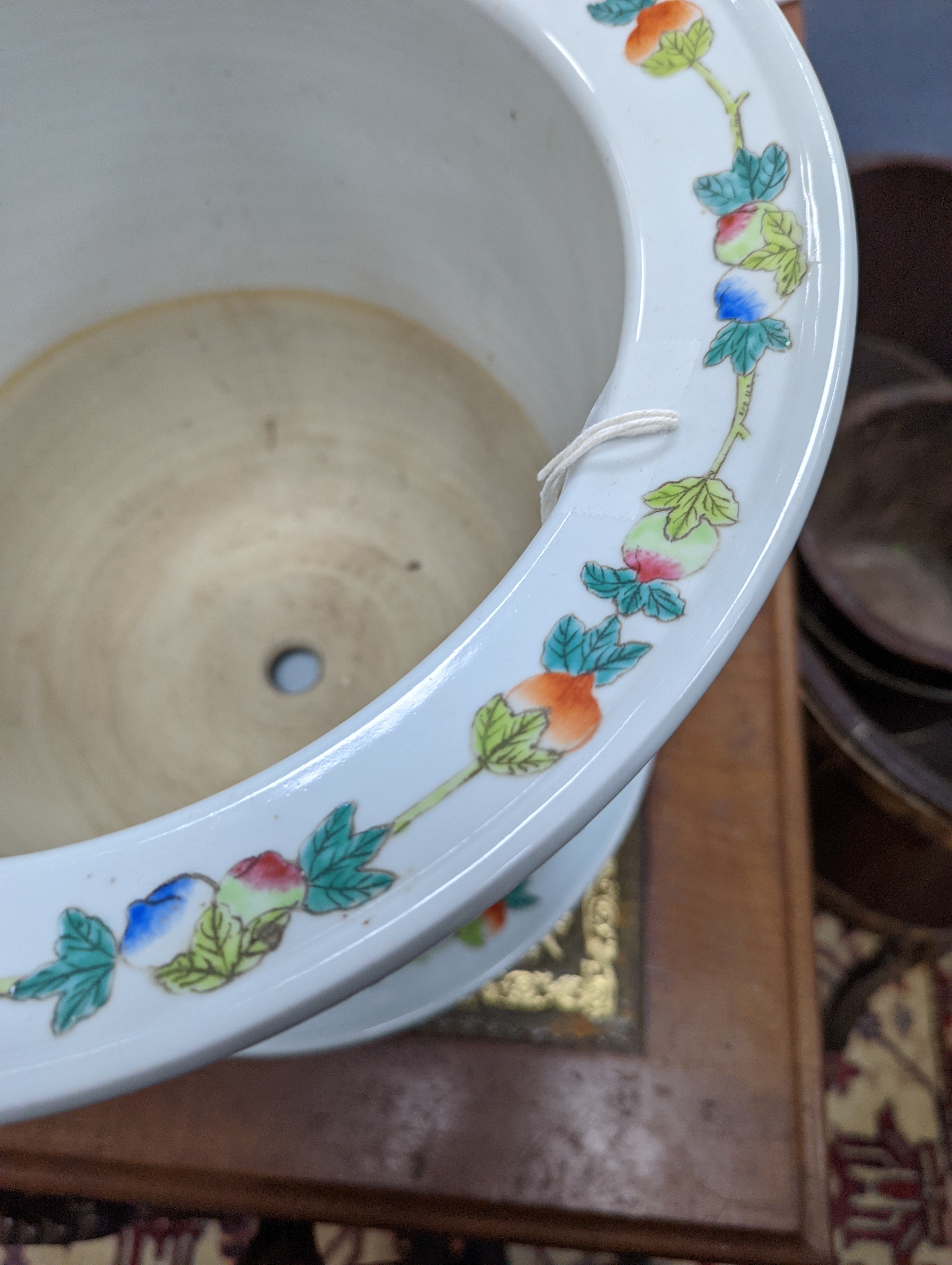 A 20th century Chinese porcelain jardiniere and dish, diameter 36 cms.